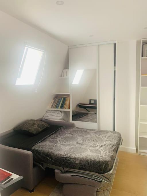 Studio Cosy Au Coeur De Париж Экстерьер фото