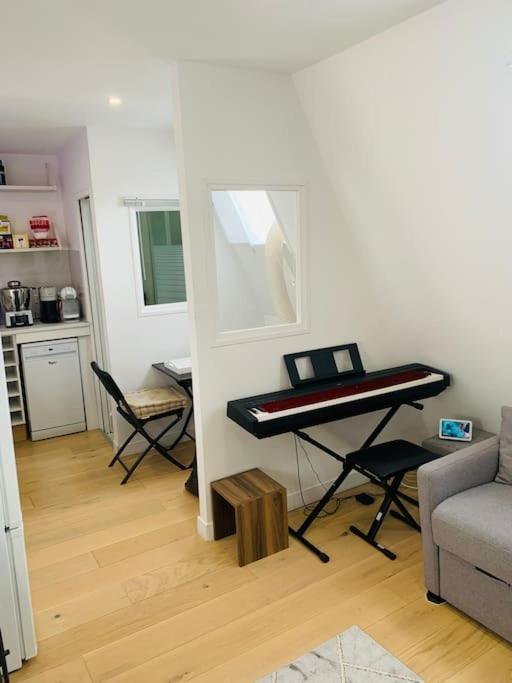 Studio Cosy Au Coeur De Париж Экстерьер фото